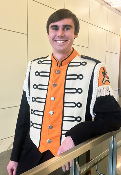 Christopher Busch in UT Pride of the Southland Band marching uniform.