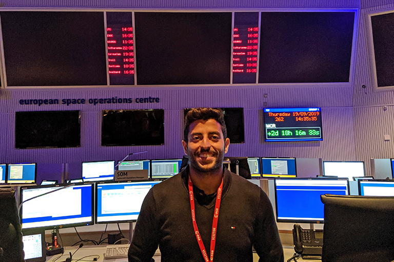 Naser Burahmah poses in the European Space Operations Center main control room.