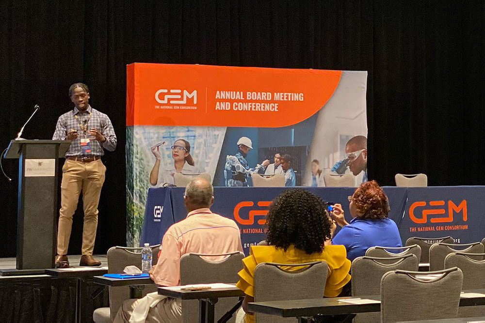 Promise Adebayo-Ige presents research at the GEM conference.