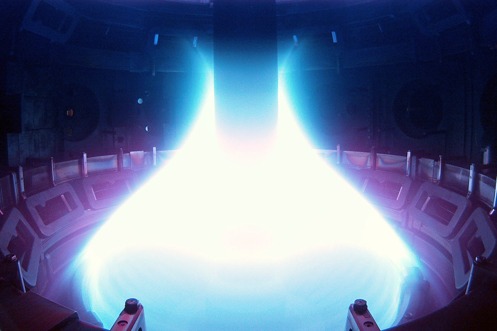 Hot plasma, magnetically confined in a tokamak.