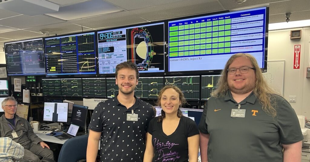 Ray Mattes, Livia Casali, and Austin Welsh at the DIII-D National Fusion Facility standing in front of computer screens