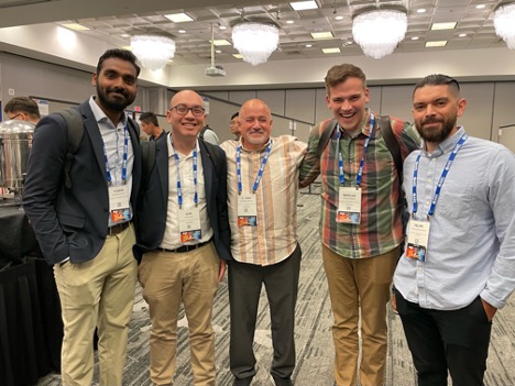 faculty and students posing for a photo at the TOFE conference in Madison, Wisconson