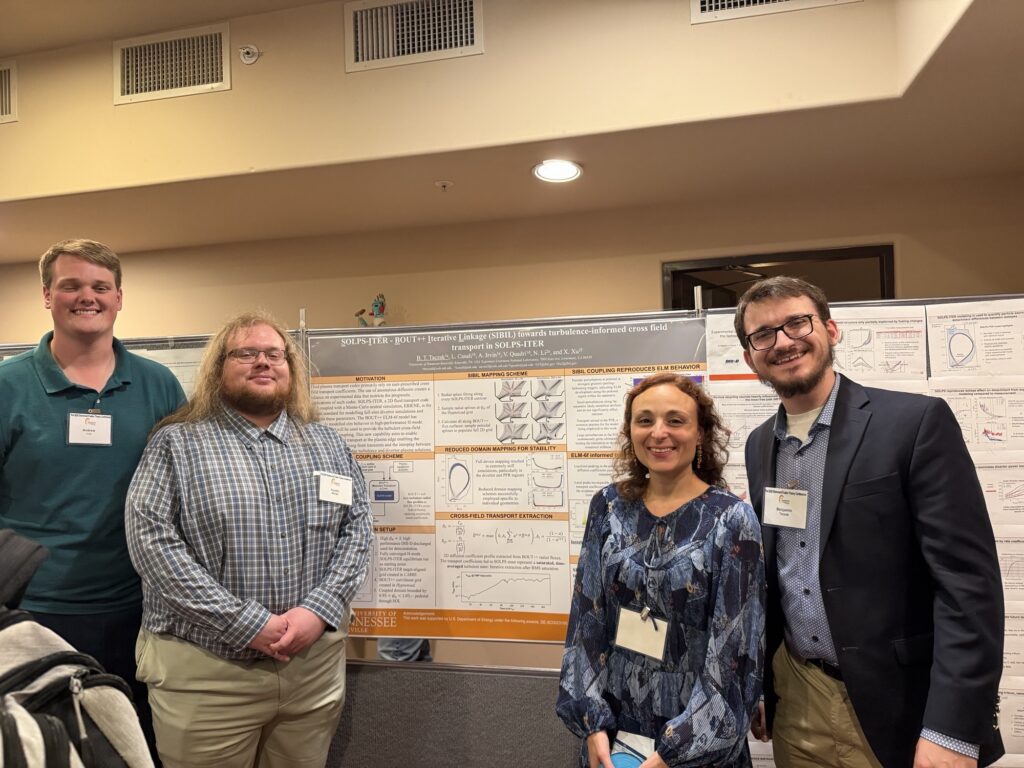 Assistant Professor Livia Casali stands in front of conference poster with research partners